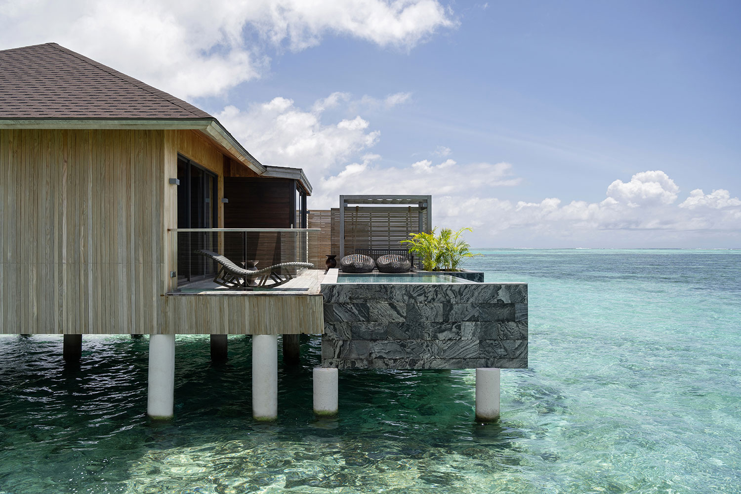 Resort infinity pool (about page / wellness context) at Madifushi Private Island